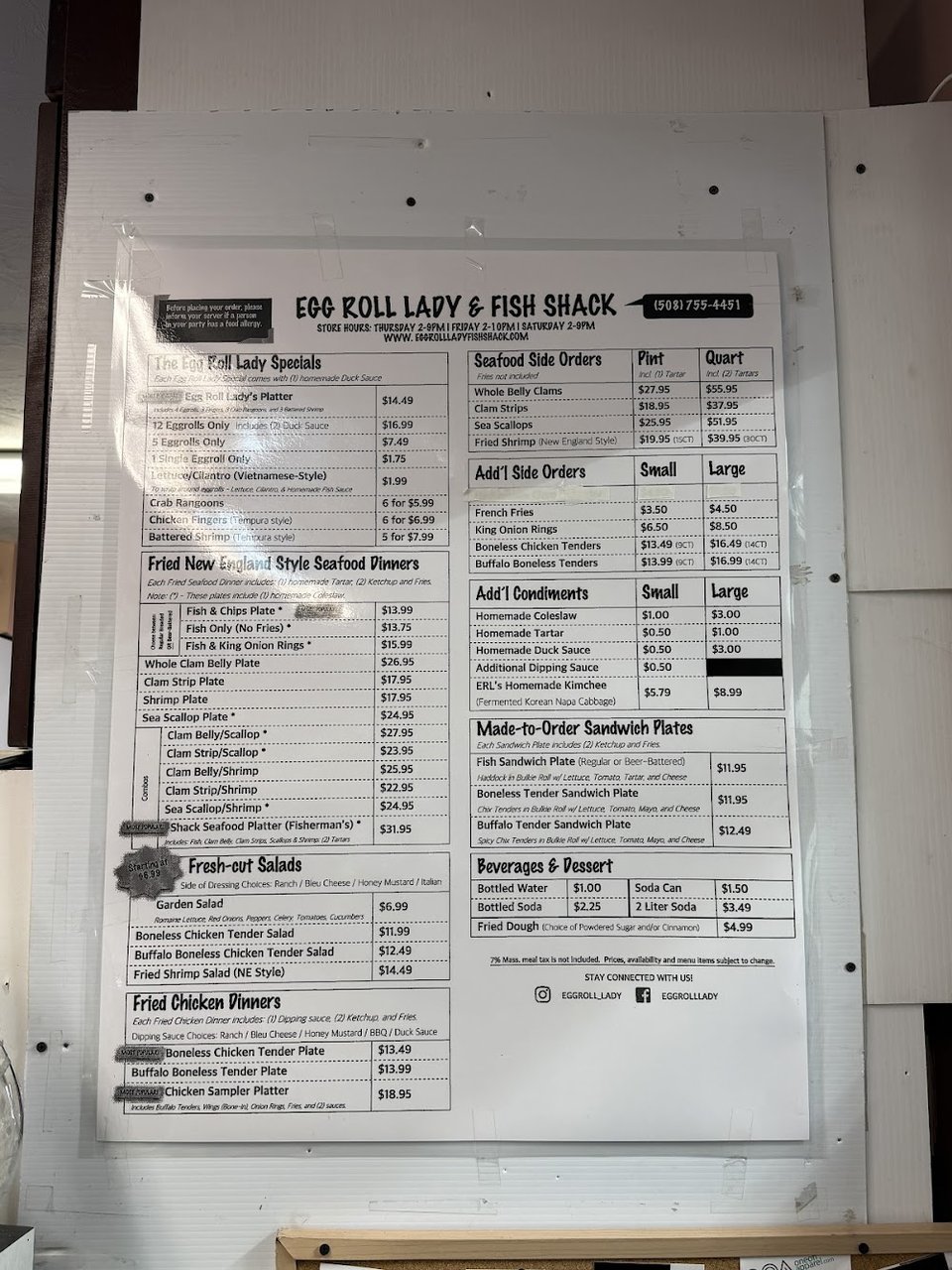 Restaurant menu with seafood specials and takeaway options.